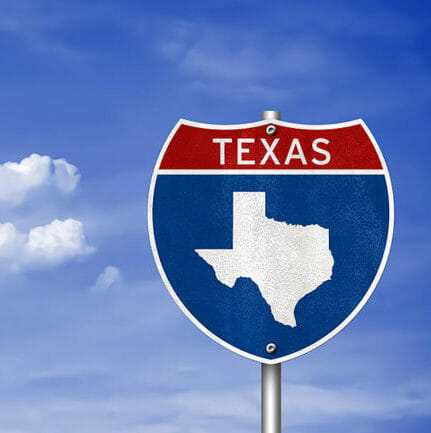 texas highway sign with blue sky